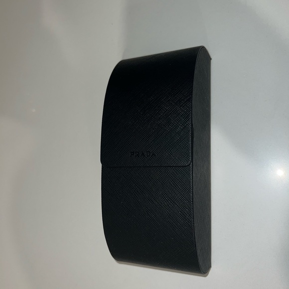Women’s black Prada sunglasses